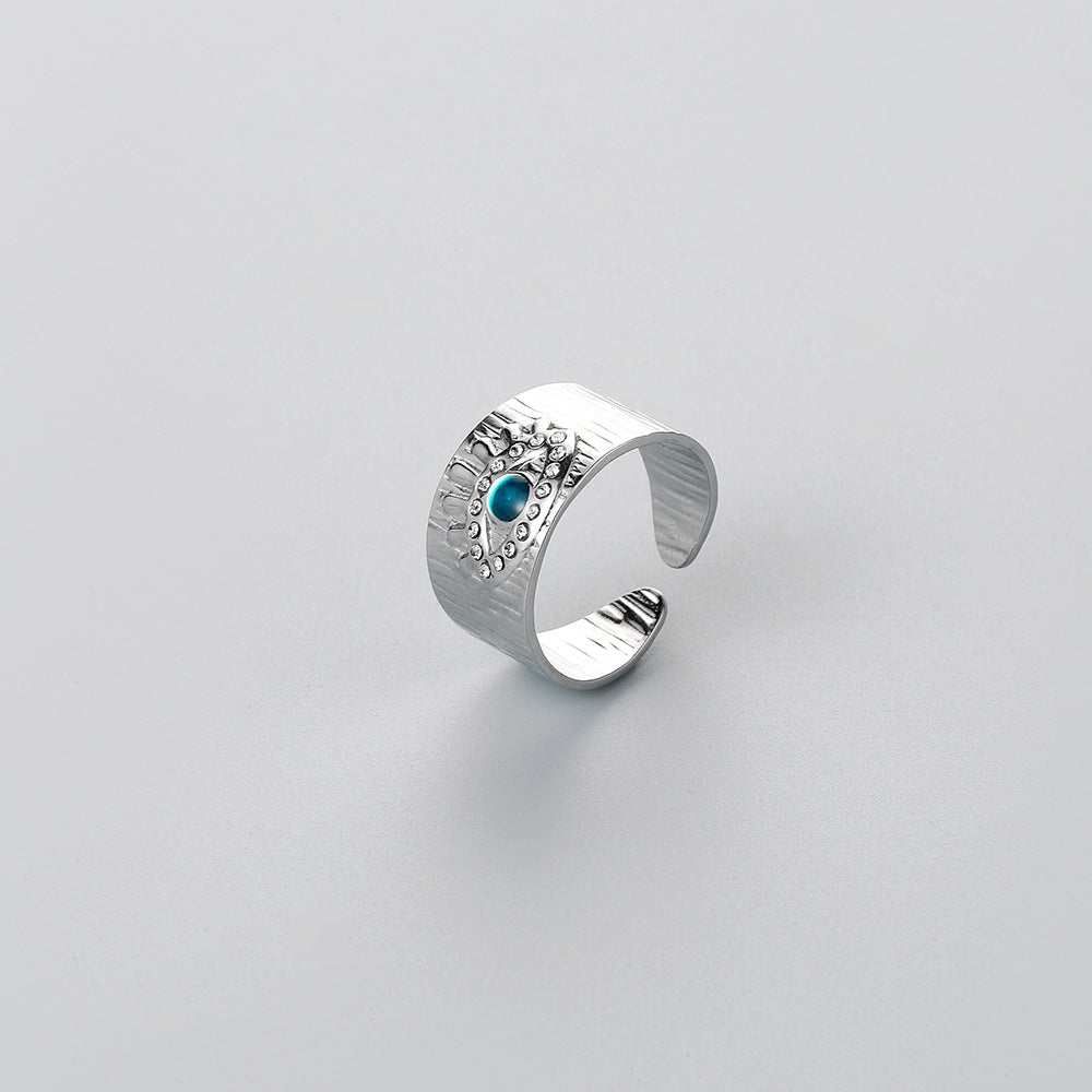 Venta al por mayor Anillos De Ojos Azules De Acero De Titanio Para Hombres